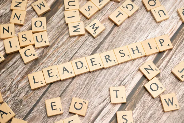 Scrabble pieces showing the word leadership