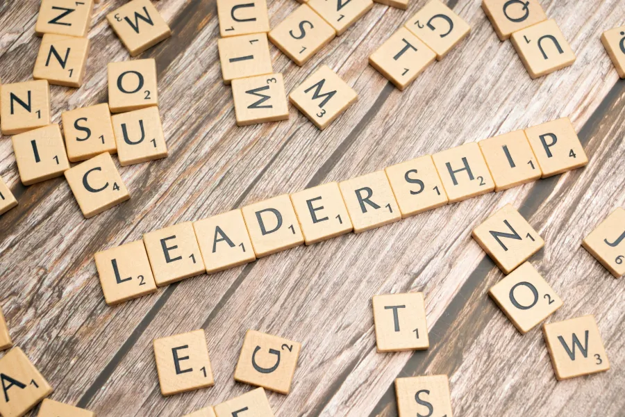Scrabble pieces showing the word leadership